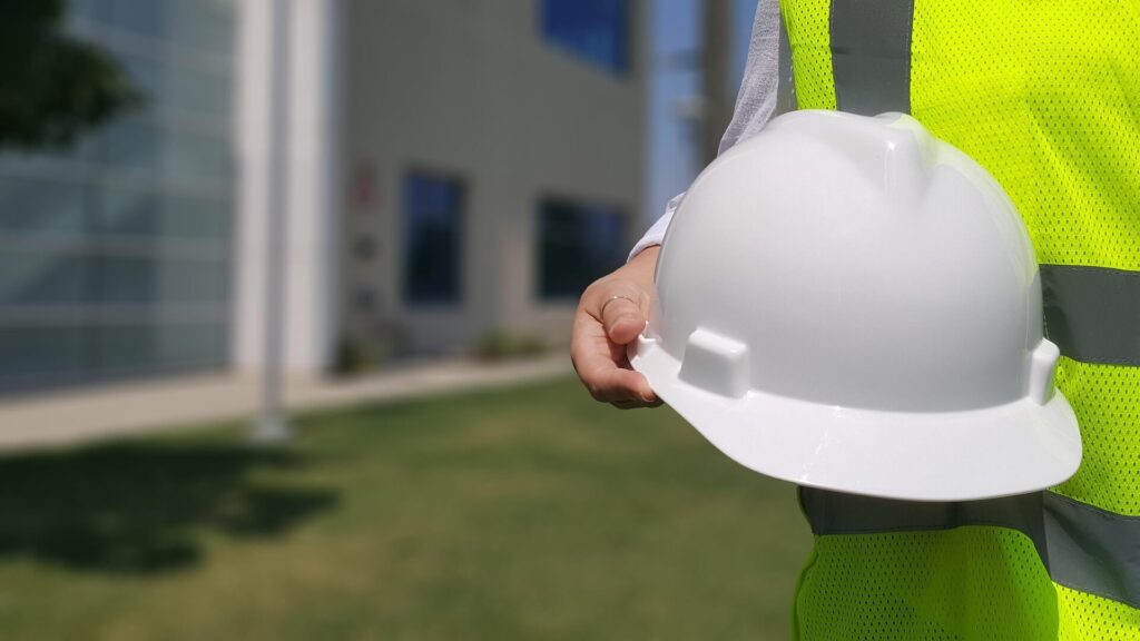 Landscape Architect Baton Rouge - An image of an employee holding a hard hat